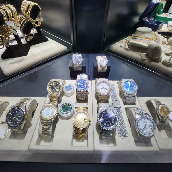 display case of watches and jewelry
